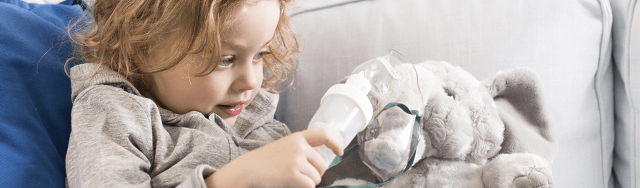 Child with asthma and toy